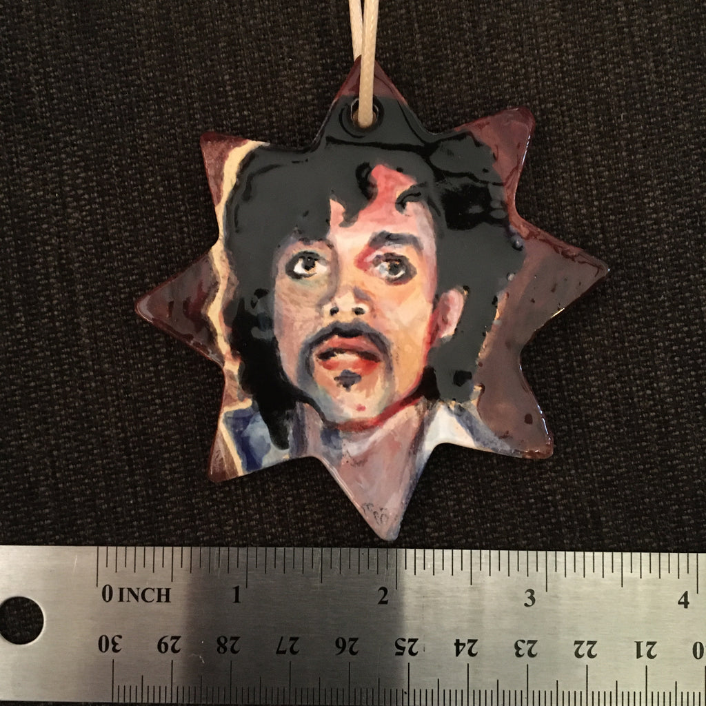 Hand built and hand painted ceramic Prince ornament