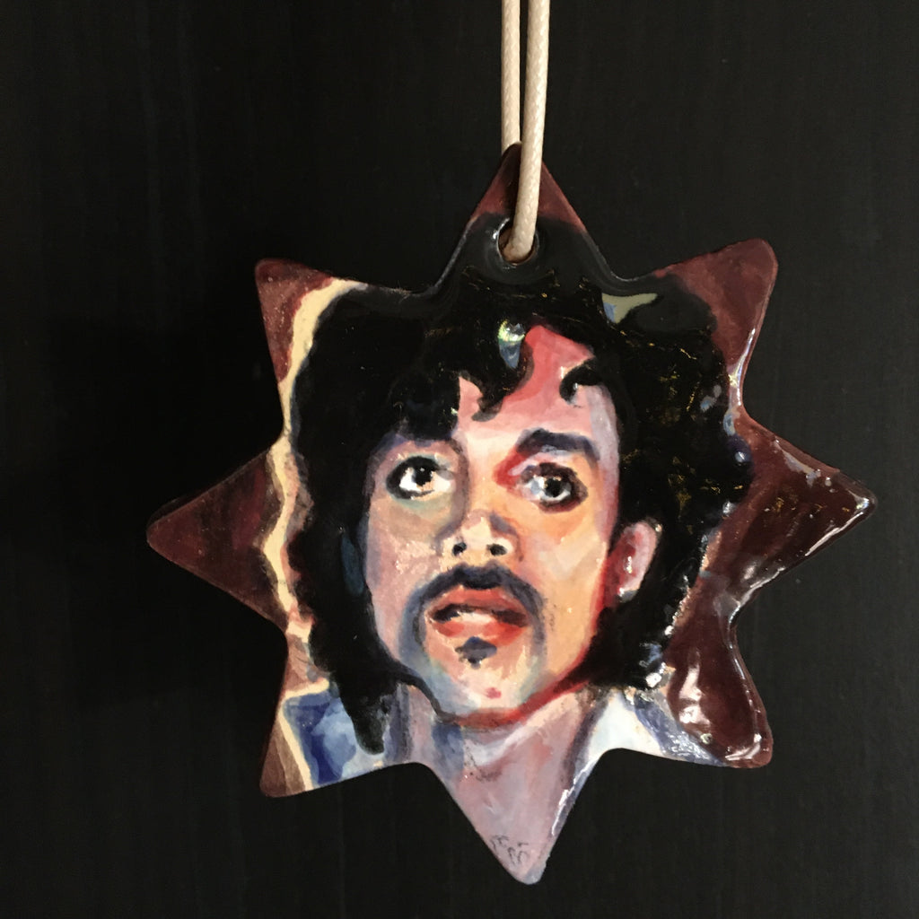 Hand built and hand painted ceramic Prince ornament